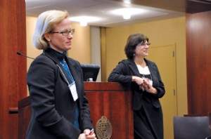 Annette McLaughlin, (left), who provides career counseling to Fordham alumni, and Linda Horisk, an assistant dean at GSE, listen as workshop attendees discuss switching careers. Photo by Gina Vergel