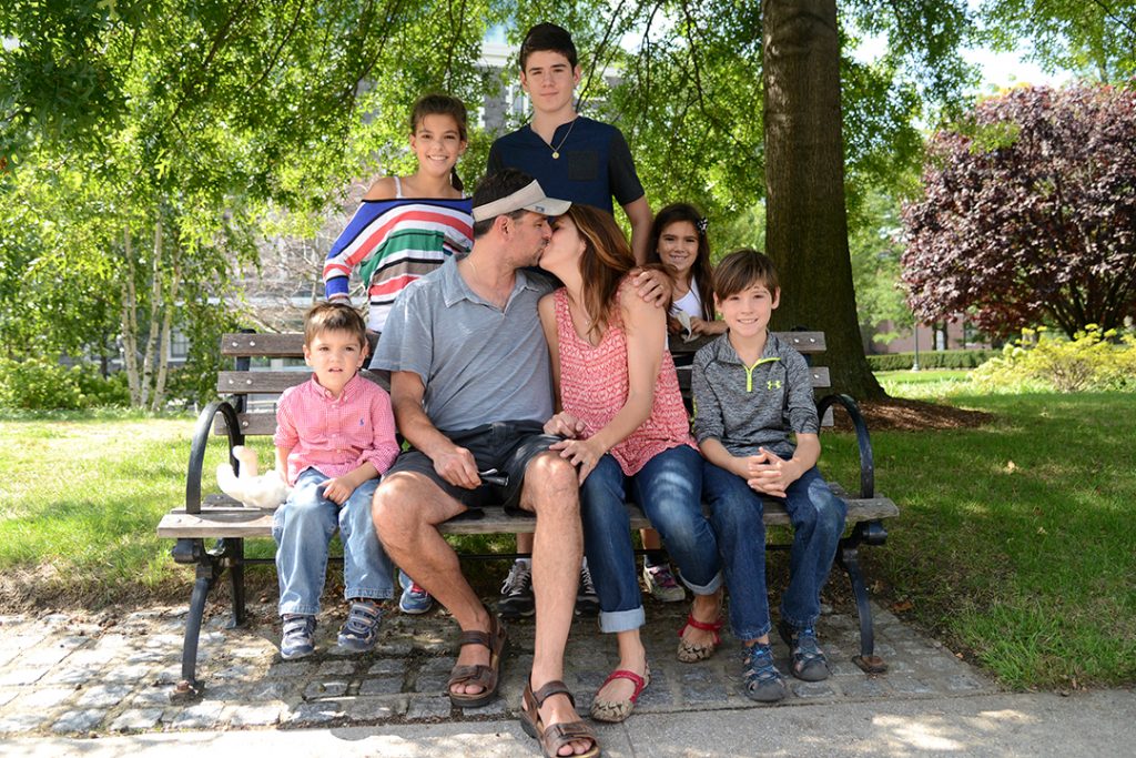 The Bournos brood visit the bench where mom and dad shared their first kiss. 