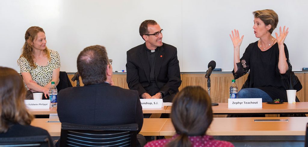 Jessica Baldwin-Philippi, Ph.D., assistant professor of communication and media studies, Eric Sundrup, S.J. associate editor of America magazine, and Zephyr Teachout, associate professor of law, sitting at a table in a classroom at Fordham Law