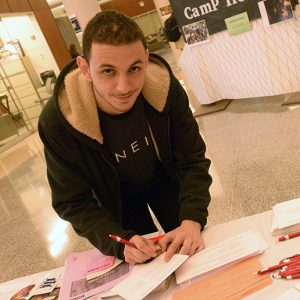 The last stop in the installation was an advocacy table with information on refugees and DACA, as well as an opportunity to write Congress. 