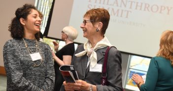 Two women share a conversation at the inaugural Women's Philanthropy Summit last year.