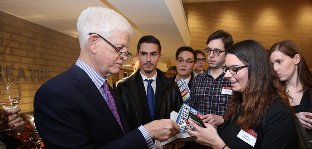 Mario Gabelli signing books for Gabelli School Students at the McNally Amphitheatre