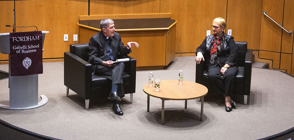 Steve Katsouros, S.J and Lidia Bastianich sit on stage at the McNally Amphitheatre at the Lincoln Center campus