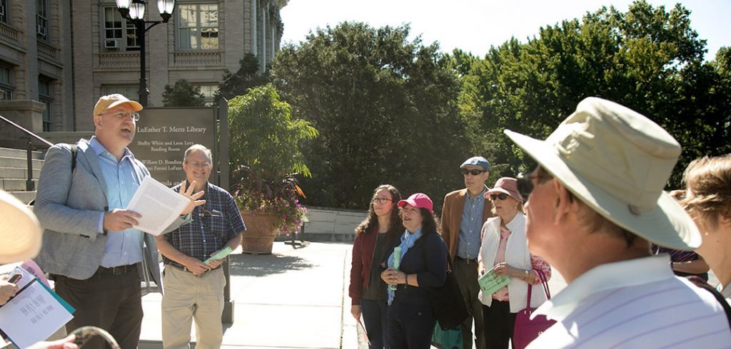 An alumni tour group led by Professor Matthew McGowan at the New York Botanical Garden