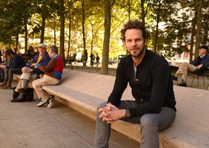 John Seitz sitting on a bench