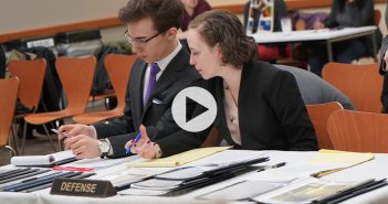 Mock Trial defense team confers