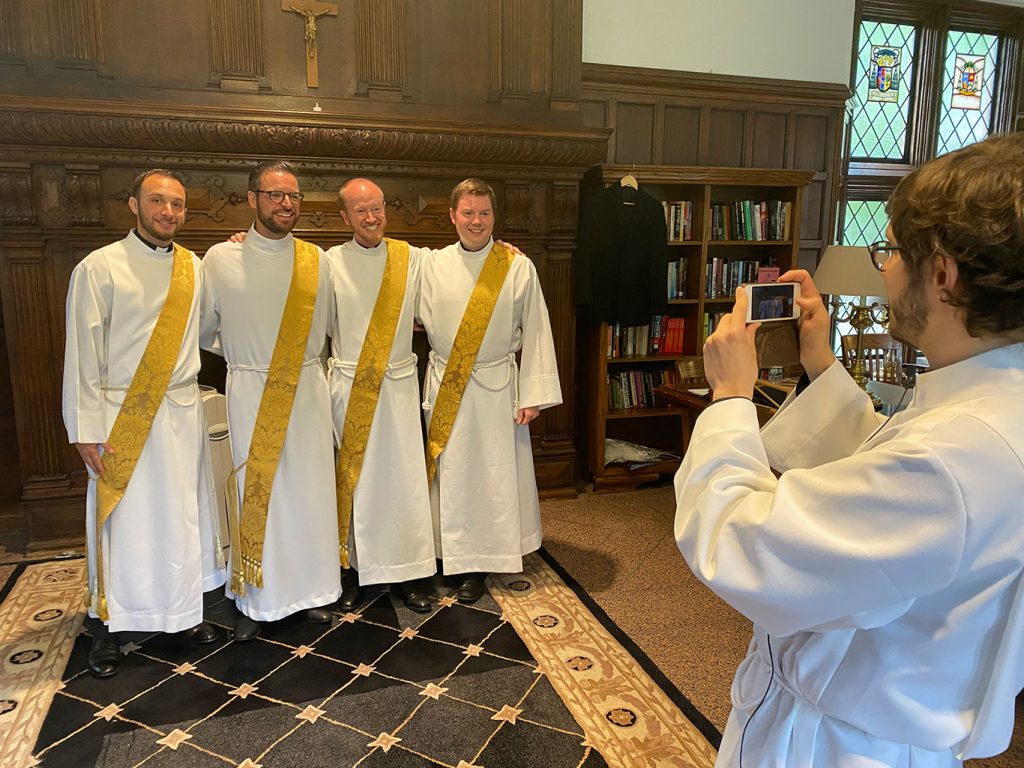 Michael Lamanna, SJ, Zachariah Presutti, SJ, Daniel Gustafson, SJ and William Woody, SJ posing for a group pho