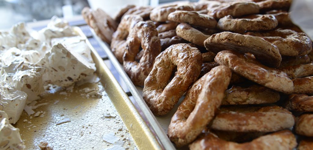 Torrone and roccoco cookies grace the window of Gino's.