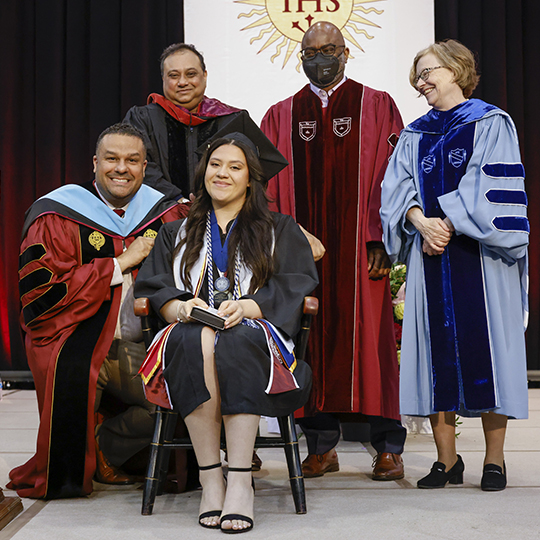 Renaldo Alba, Biswa Bhowmick, Patrick James, Maura Mast congratulate Emily Romero, recipient of The Anne E. Leicht Memorial Award and The Fordham College Alumni Association Chair. 