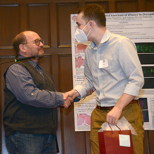 Edward Dubrovsky presents Fordham College Alumni Association Award went to senior Max Luf