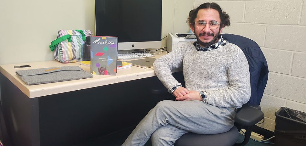 GerardoGerardo Sámano Córdova sits at his desk