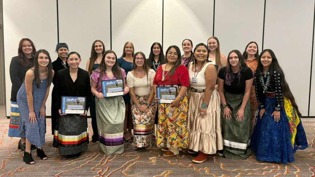 With Focus on Environment and Native Communities, Student Earns Udall Scholarship A group of students standing together in a room.