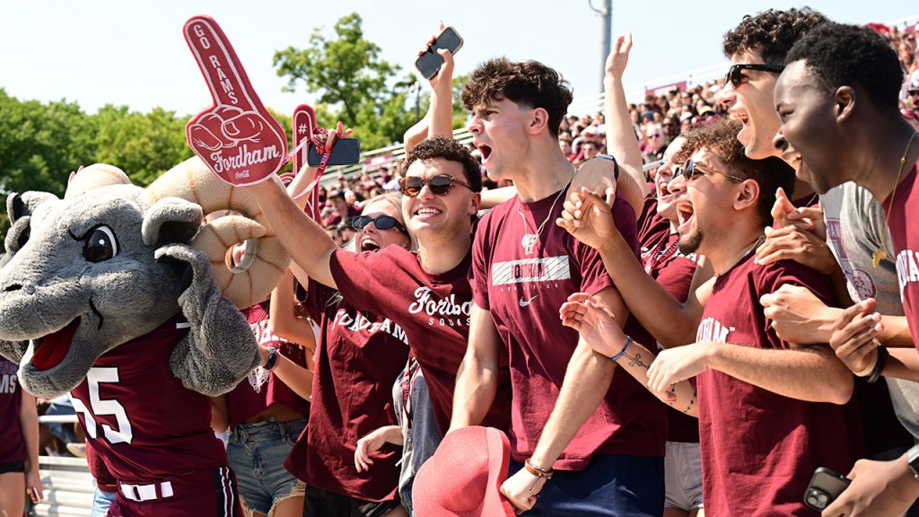 Photos: 5,000 Strong, Rams Return for Homecoming Fordham fans cheer at Homecoming 24 with Ramses.