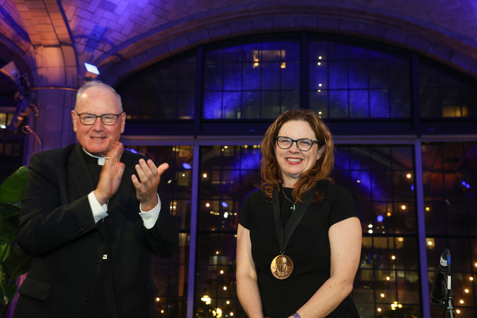 President Tetlow, Fordham Students Recognized at Pierre Toussaint Scholarship Dinner Archbishop of New York Timothy Michael Cardinal Dolan with Fordham President Tania Tetlow. He awarded her the Pierre Toussaint Medallion.