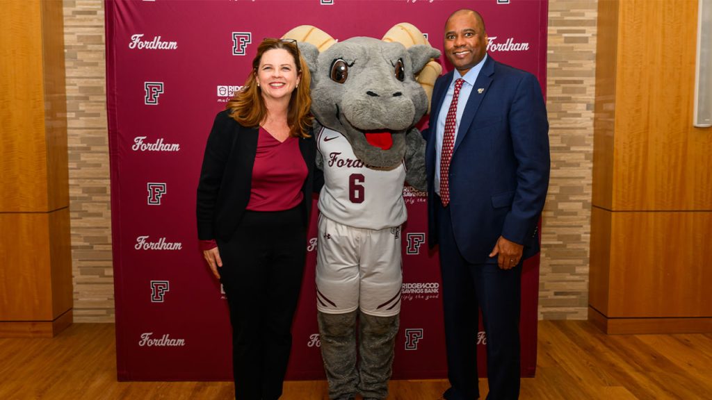 New York Native Charles Guthrie Brings Winning Ways to Fordham Charles Guthrie, right, with Fordham President Tania Tetlow and Ramses.
