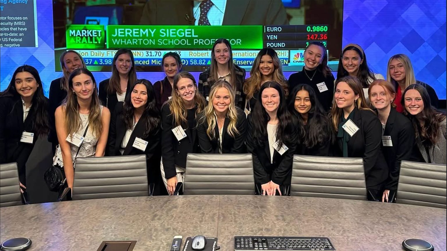 The Smart Woman Securities club poses on an outing at Goldman Sachs,