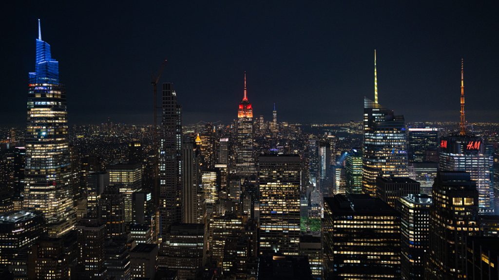 A panoramic view of the NYC cityscape at night