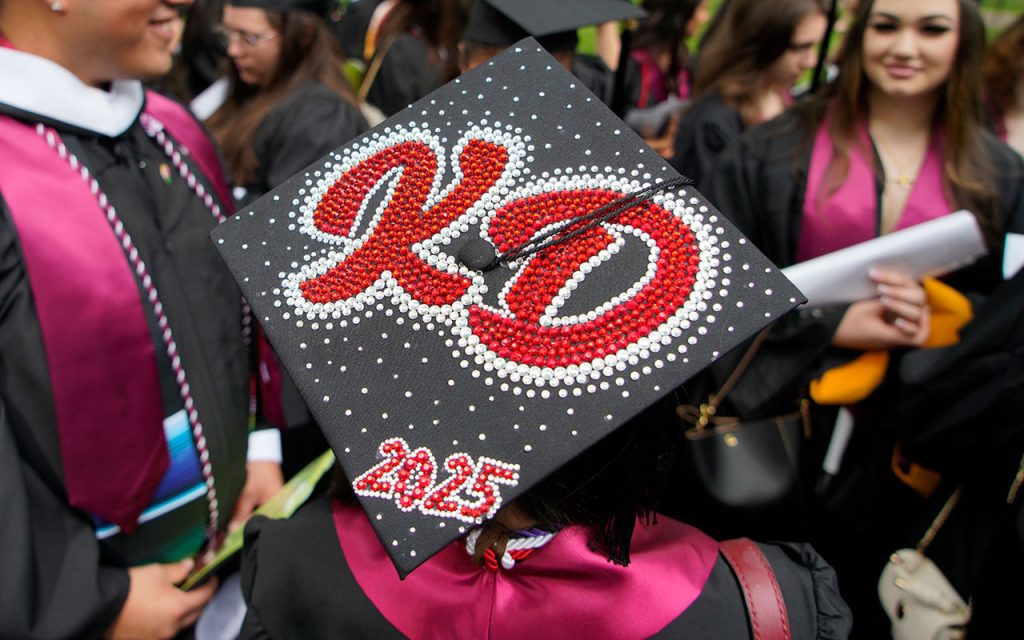 Commencement cap decorated with the message "KD 2025"