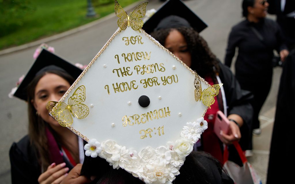Commencement cap decorated with the message "For I know the plans I have for you, Jeremiah 29:11"