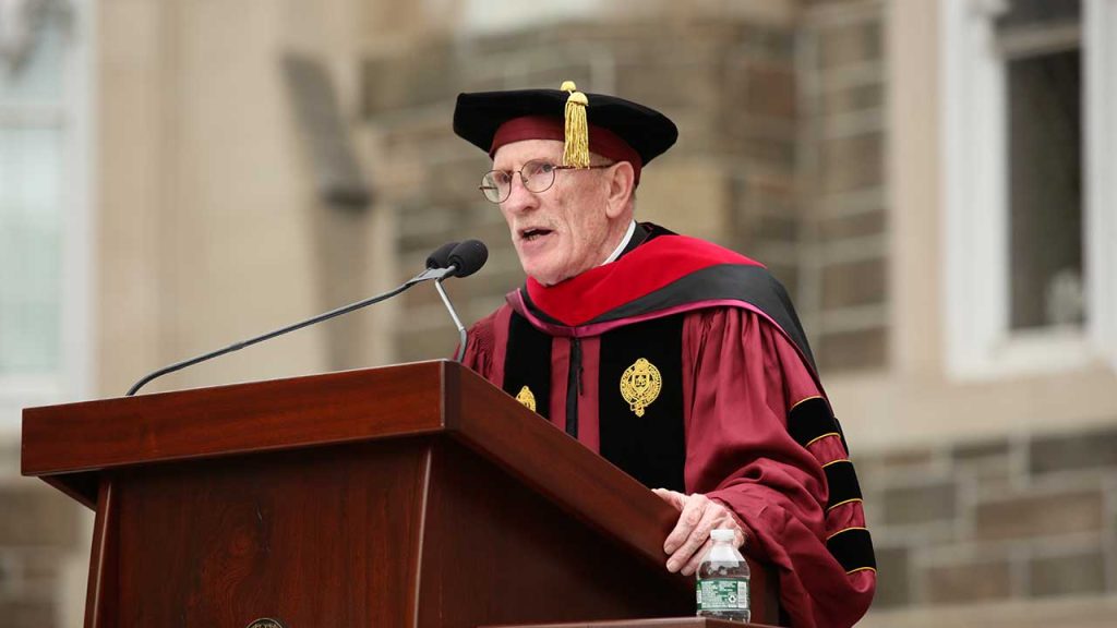joseph mcshane in academic robe at fordham commencement