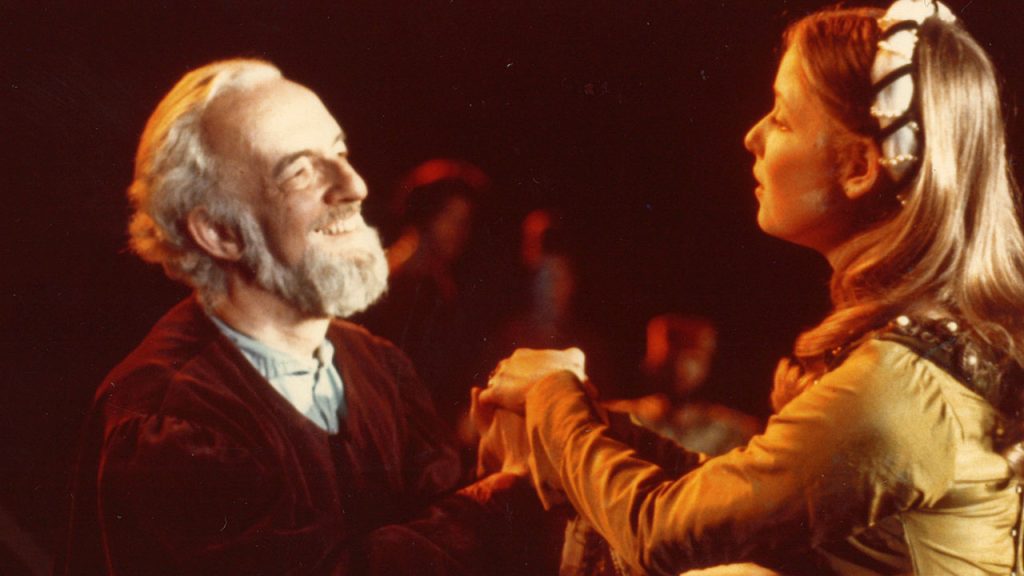 Professor Bob Stone performs on stage with Laura Ferri