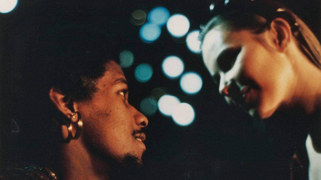 A closeup of Denzel Washington and Dianne Hammarth as Othello and Desdemona 