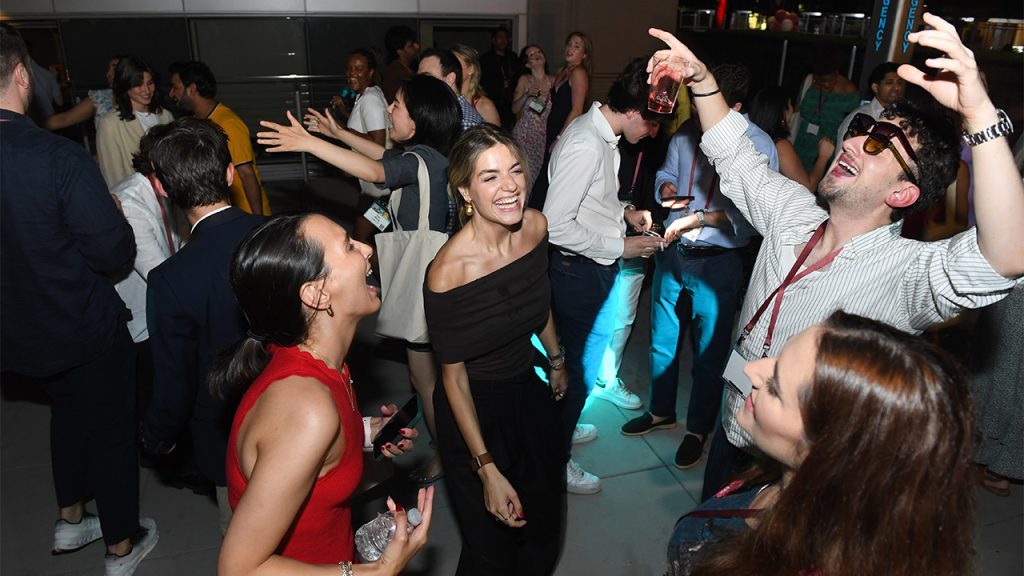 Group of Fordham grads dancing Block Party Lincoln Center