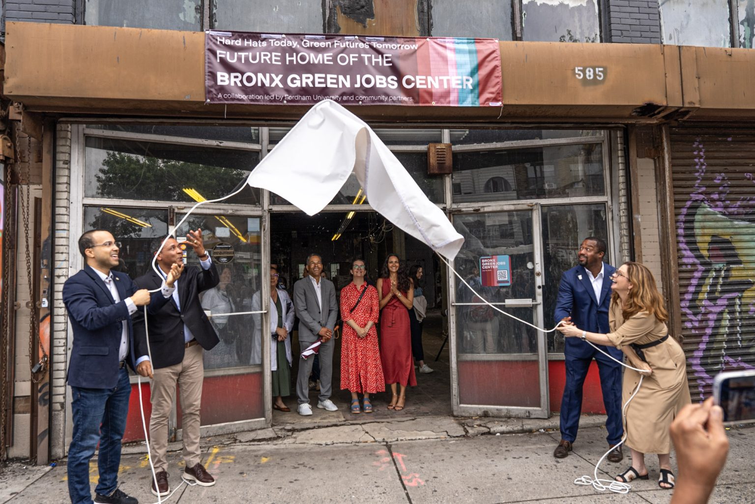 From left: NYC Councilmember Oswald Feliz, State Assemblymen George Alvarez and Landon Dais, and Fordham President Tania Tetlow. Photo: Chris Taggart