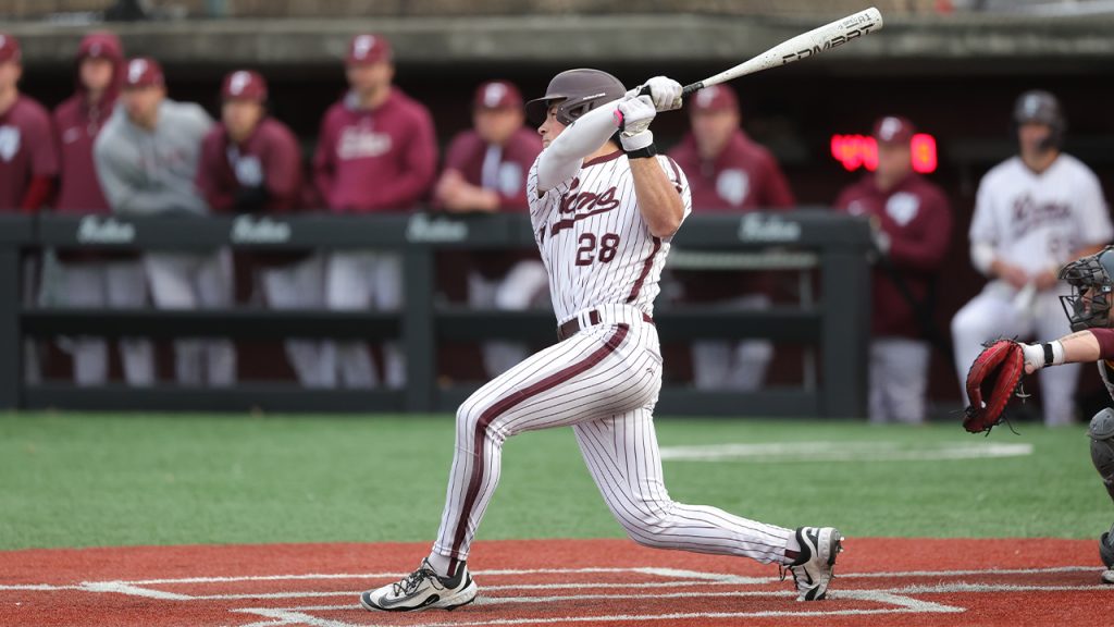 Daniel Bucciero swinging at home plate