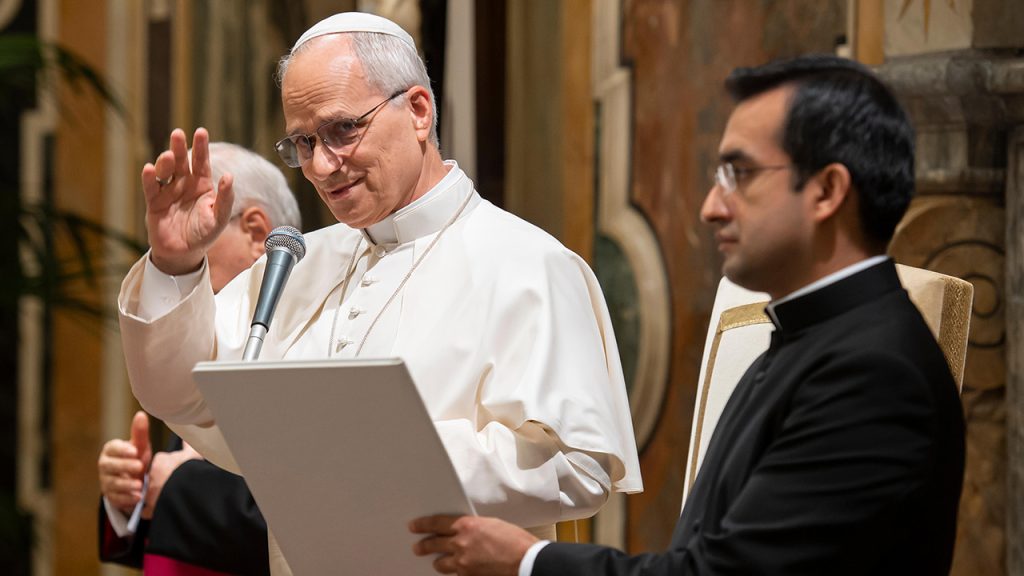 Pope Leo reading a statement at a Vatican event.
