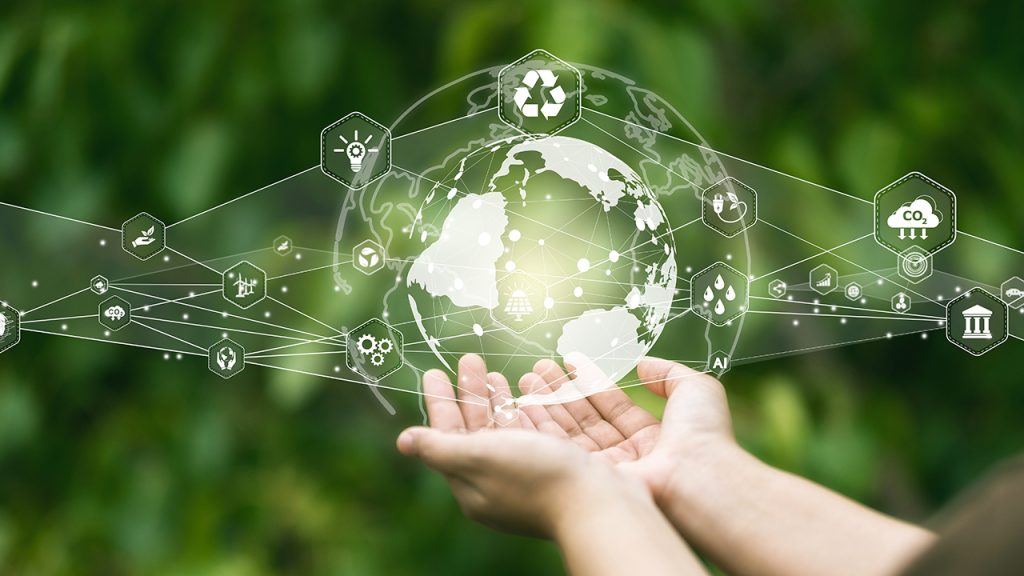 Illustration of cupped hands, the earth, and electronic imagery