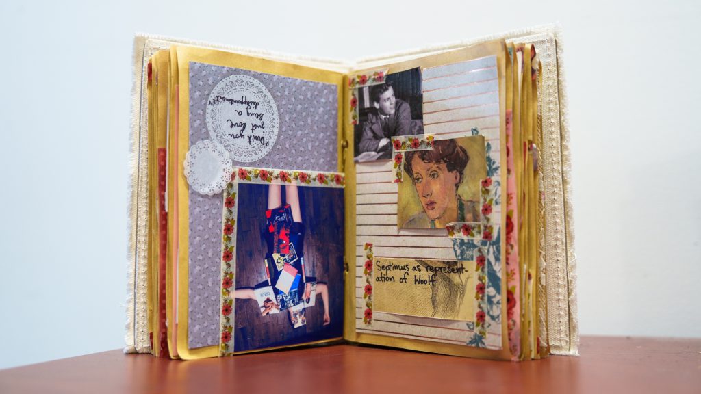 A handmade diary open on a desk