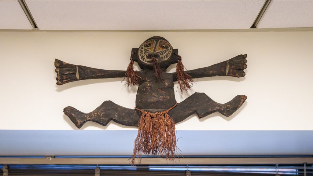 A South Pacific god statue on a wall