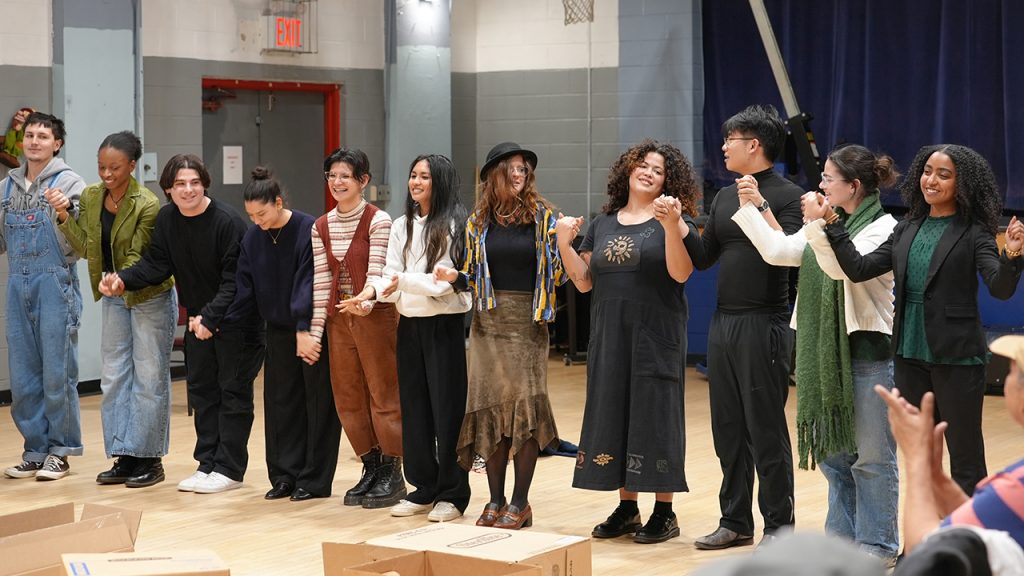 Fordham students taking a bow after performing at Goddard Riverside, a Manhattan community center, for a course on theater and social justice